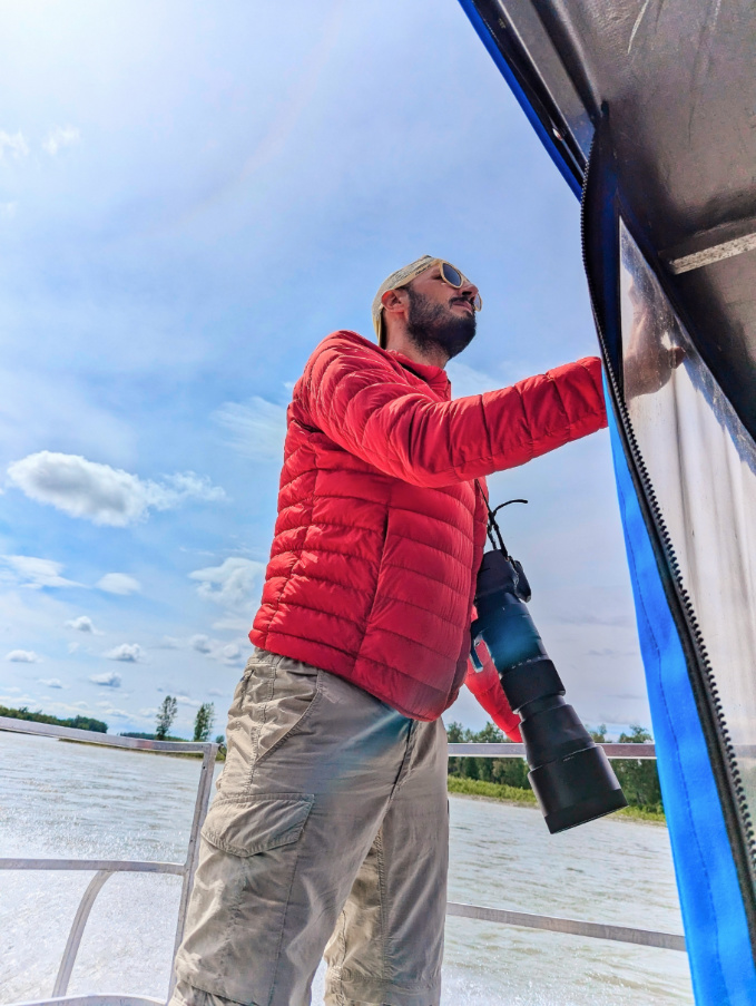 Rob Taylor with Camera on Mahays Jet Boat Tours on Susitna River Talkeetna Alaska 1