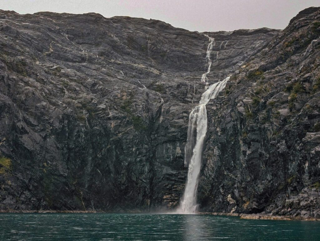 Waterfall on Blackstone Bay Glacier Cruise Prince William Sound with Lazy Otter Tours Whittier Alaska 2