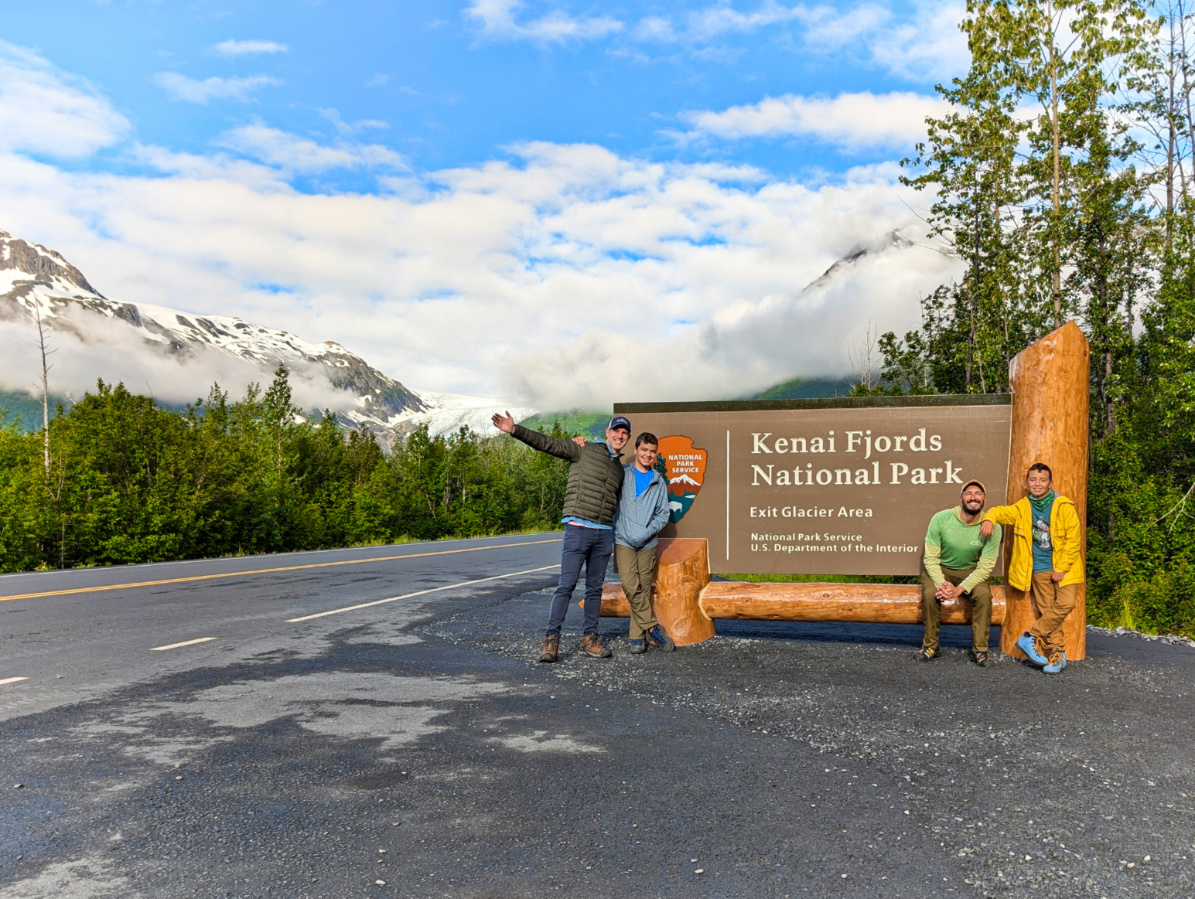 Full Taylor Family at Kenai Fjords National Park Entrance Sign Seward Alaska 1