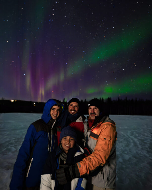 Full Taylor Family with Northern Lights Aurora Borealis at Aurora Pointe Fairbanks Alaska 1