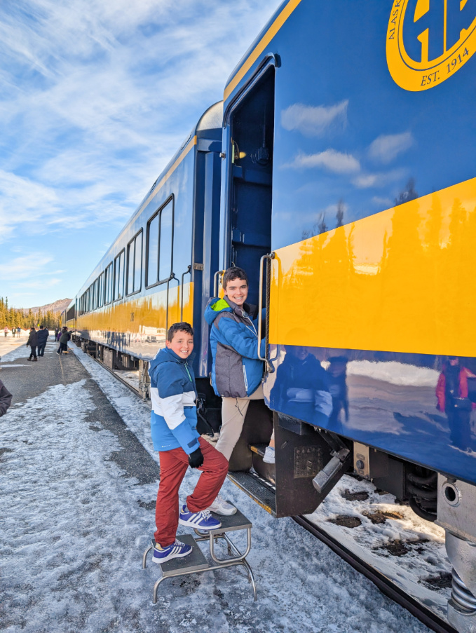 Taylor Family with Alaska Railroad Aurora Winter Route at Denali Park Train Station 3