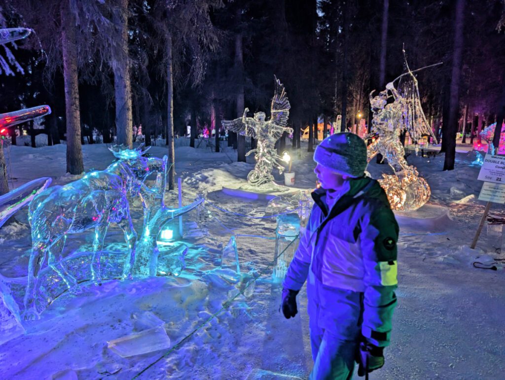 Taylor Family with Ice Sculptures at Ice Alaska World Ice Art Championships Fairbanks Alaska 5