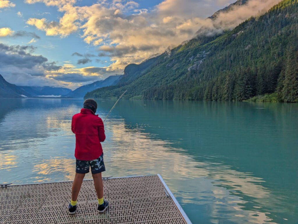 Taylor Family fishing on dock in Chilkoot Lake State Park Haines Alaska 1