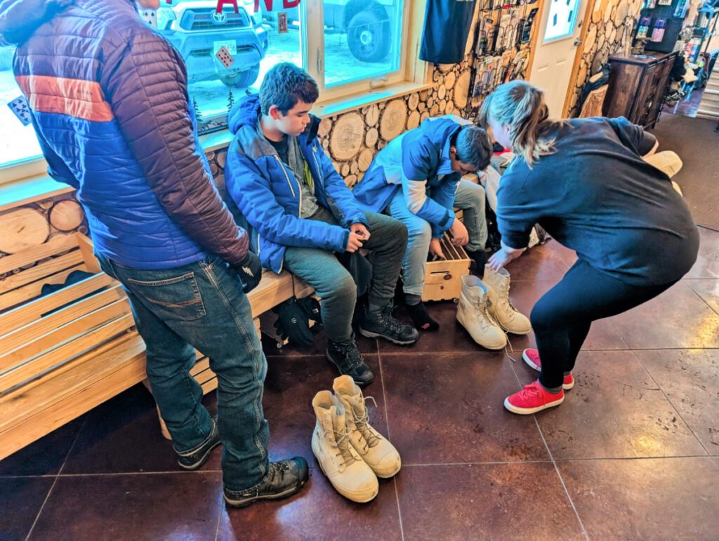 Taylor Family in Snow Gear at Rods Alaskan Guide Service Snowmachine Tours North Pole Alaska 3