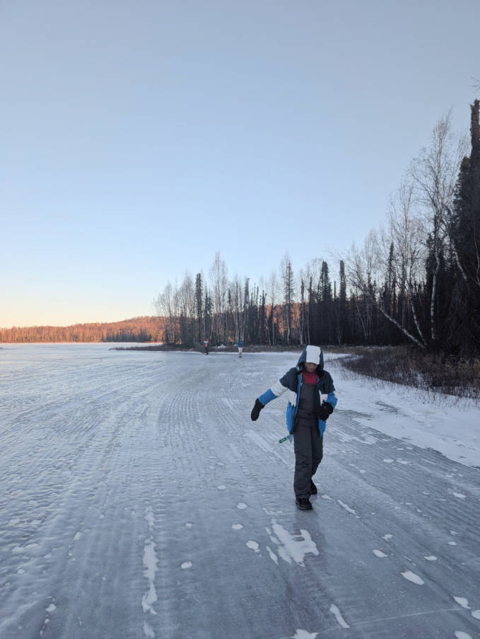 Taylor Family walking on frozen XY Lakes Talkeetna Alaska 2