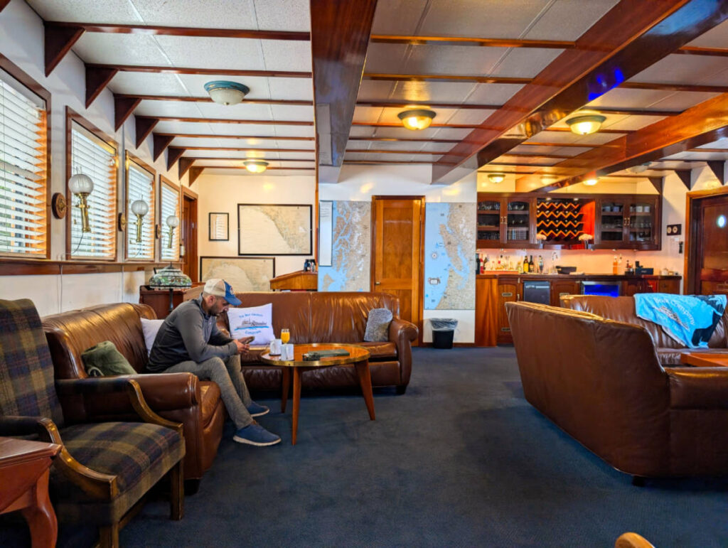 Rob Taylor relaxing on Mist Cove sailing with the Boat Company Southeast Alaska 1