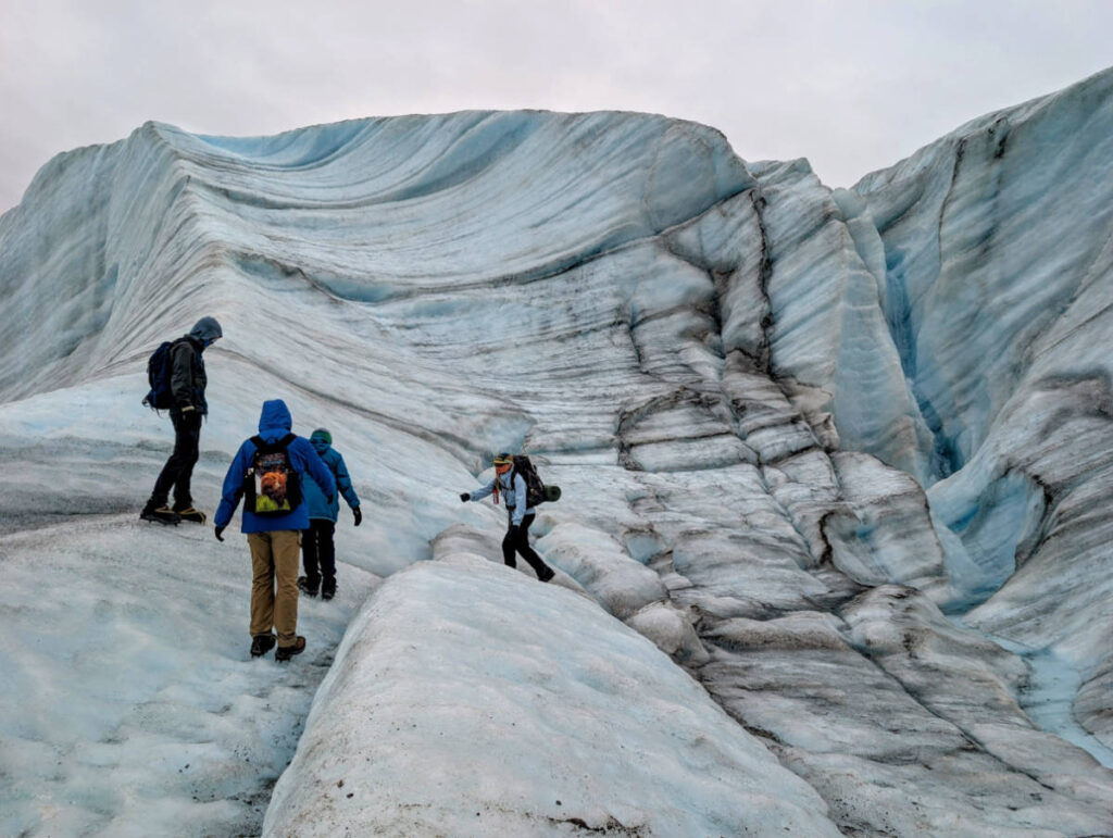 Taylor Family hiking on Root Glacier with Kennicott Wilderness Guides in Wrangell St Elias National Park McCarthy Alaska 2