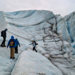 Taylor Family hiking on Root Glacier with Kennicott Wilderness Guides in Wrangell St Elias National Park McCarthy Alaska